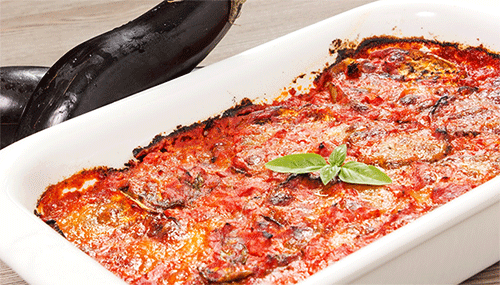 Melengiòin a parmeggiòin Parmigiana di melanzane